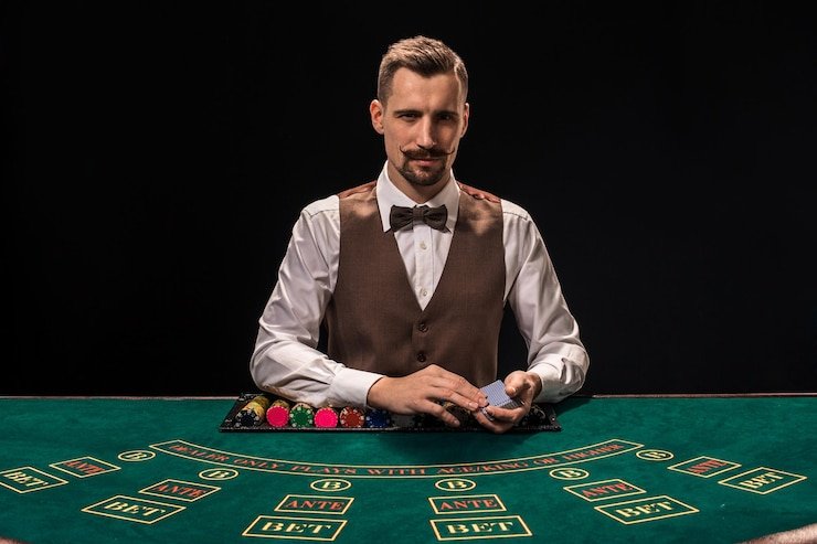 Blackjack hand showing player with ace-king totaling natural 21, dealer showing 6